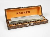 The Hohner Sixty-Four Chromonica Chromatic four octave harmonica.