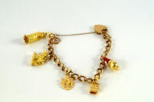 A 9ct gold curb link charm bracelet