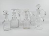 Three ring-necked mallet shaped decanters and other glass