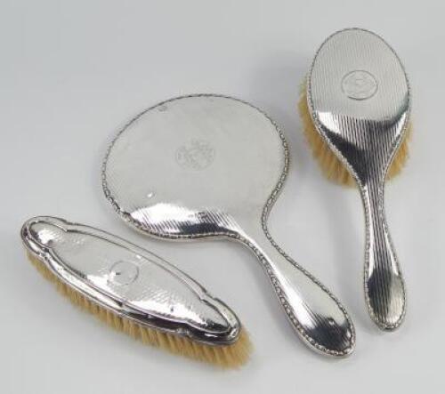 A George VI silver backed hair brush