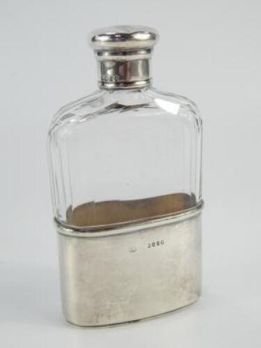 A Victorian cut glass and silver mounted spirit flask