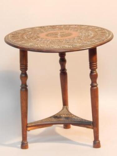 An Oriental style circular occasional table