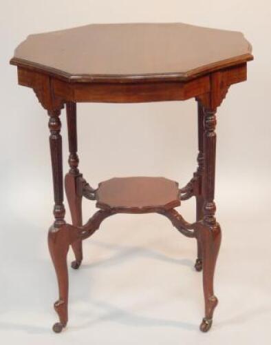 An Edwardian mahogany two tier occasional table