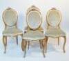 A set of four Sheraton style upholstered dining chairs