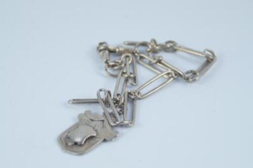 A silver figaro watch chain