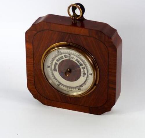 An aneroid hanging barometer