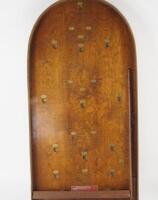 A Corinthian Brand Bagatelle board.