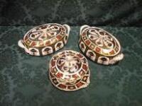 A pair of Royal Crown Derby oval tureens and covers