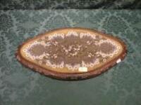 A Victorian beadwork tray of semi-elliptical form within a wooden frame and on 4 bun feet