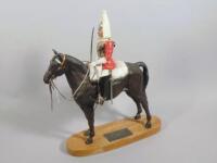 A Beswick Connoisseur model of a lifeguard officer on horseback