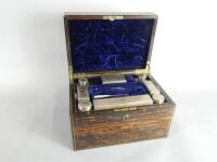 A Victorian calamander and brass bound dressing case