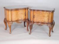 A pair of Continental inlaid walnut bedside cabinets