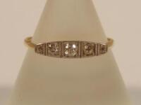 An Art Deco five stone diamond ring