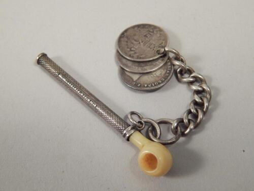 An unusual Sampson Mordan white metal propelling pencil