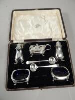 A George V silver five piece cruet