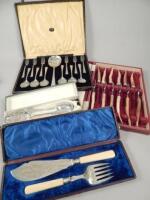 A collection of silver plated cutlery