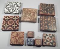 A group of Victorian encaustic style tiles