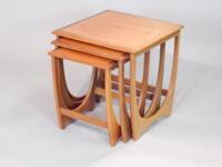 A nest of three G-Plan teak retro style tables