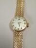 A 9ct gold ladies Tissot wristwatch