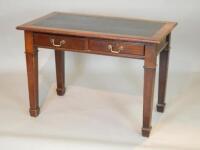 A mid 20thC mahogany writing table