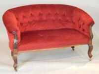 An Edwardian mahogany button back sofa