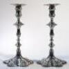 A pair of George III silver candlesticks