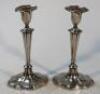 A pair of Victorian silver candlesticks