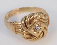 An 18ct gold knot ring