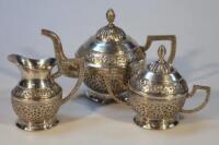 A three piece tea service