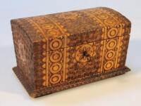 A carved hardwood jewellery casket