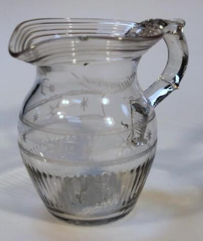 A cut glass water jug