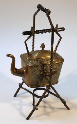 An Arts and Crafts brass spirit kettle