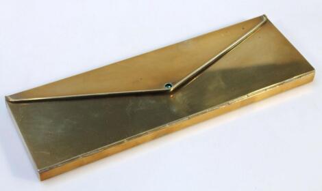 A brass taper stick box