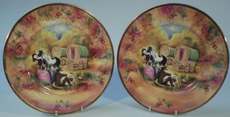 A pair of Baroness china cabinet plates