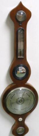 An Edwardian mahogany and boxwood strung four dial banjo barometer