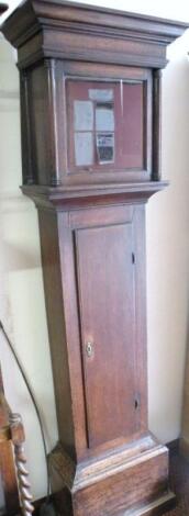 An oak longcase clock