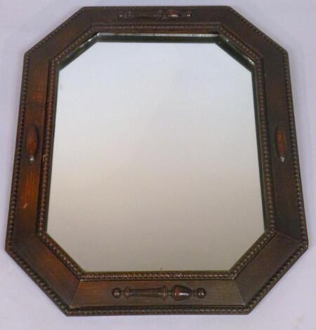 An oak wall mirror