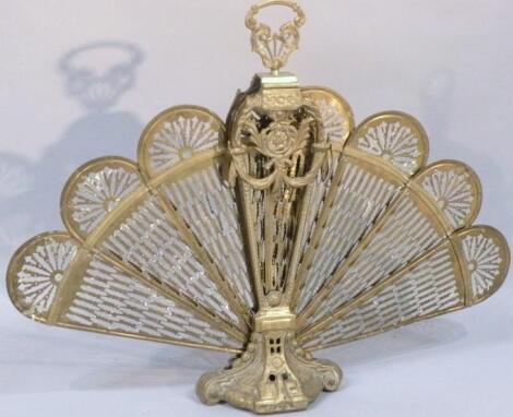 An Edwardian brass guard