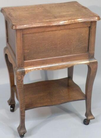 A light oak sewing box