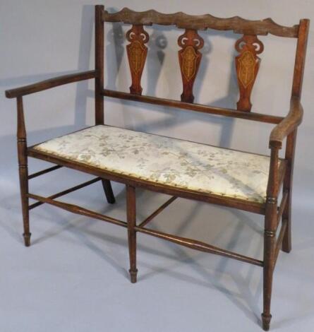 A mahogany and boxwood strung wooden framed occasional settee