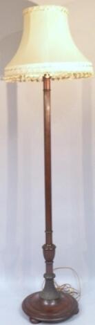 A mahogany standard lamp