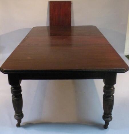 A Victorian mahogany extending table