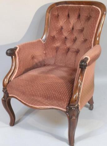 A Victorian rosewood framed open armchair