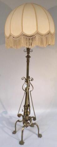 A Victorian brass gas burning standard lamp