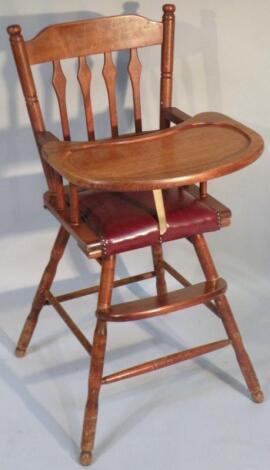 A stained beech highchair