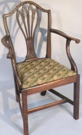 A stained elm carver chair