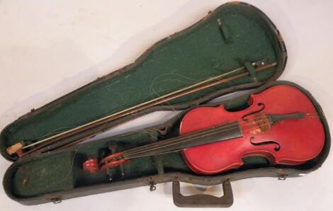 A pine cased two part violin