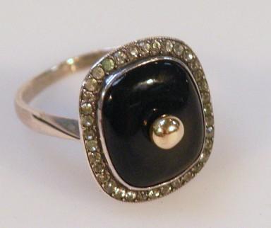 A memorial style ring