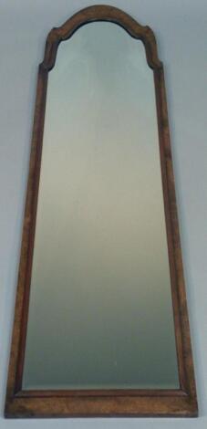 A walnut framed mirror