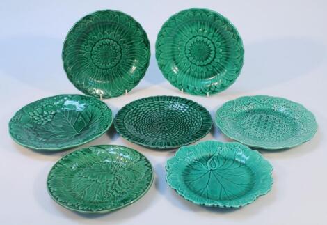 Seven various green glazed majolica plates